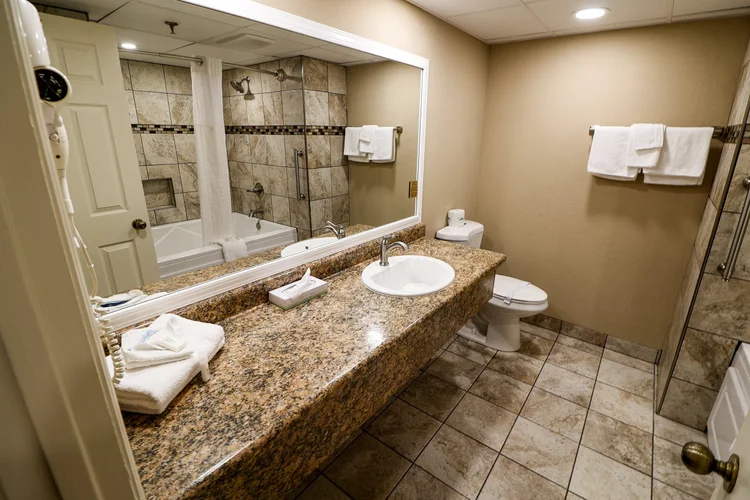 Norma Dan Motel King Room with Fireplace and/or Jacuzzi bathroom sink and toilet