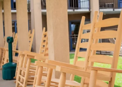 Norma Dan Motel outdoor sitting are with rocking chairs