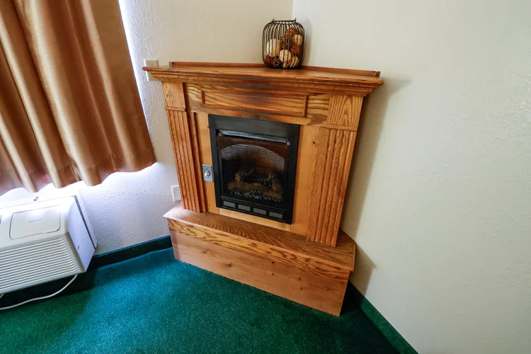 queen-fireplace-jacuzzi-gallery-9 Norma Dan Motel Queen Room with Fireplace and Jacuzzi gas log fireplace