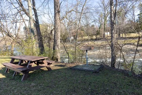 Norma Dan Riverside Cottage picnic table and charcoal grill